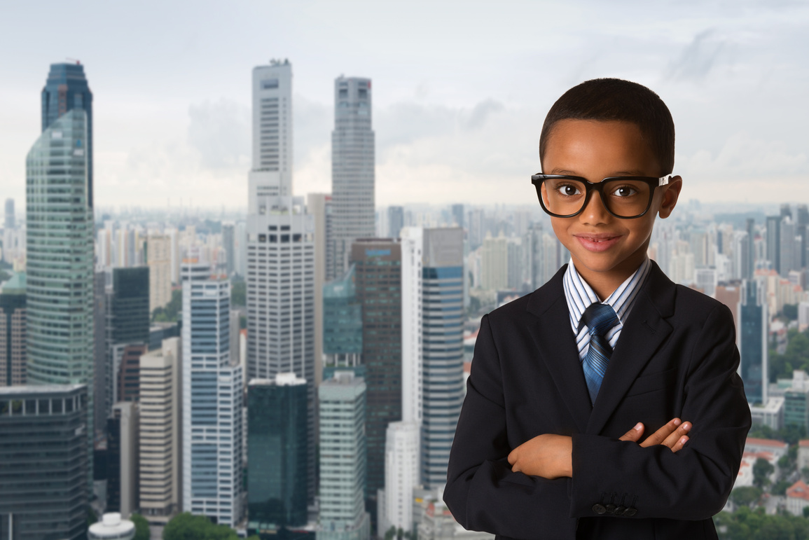 Little Boy in Glasses Wearing Business Suit
